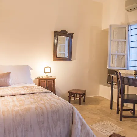 Heliophos Boutique Caves 4* أويا